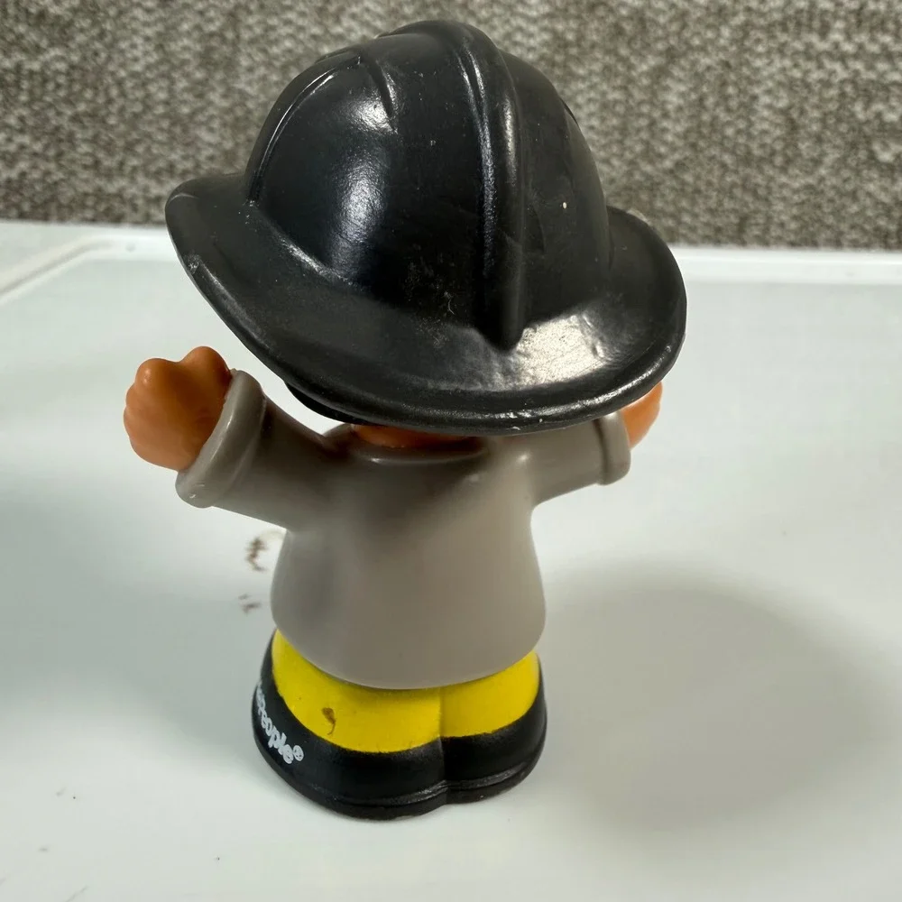 Fisher Price Little People Firefighter Figure Grey Yellow Black Fireman Toy